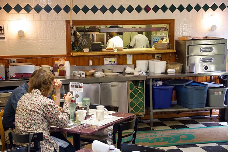 Couple eating breakfast at Clary's Diner in Savannah