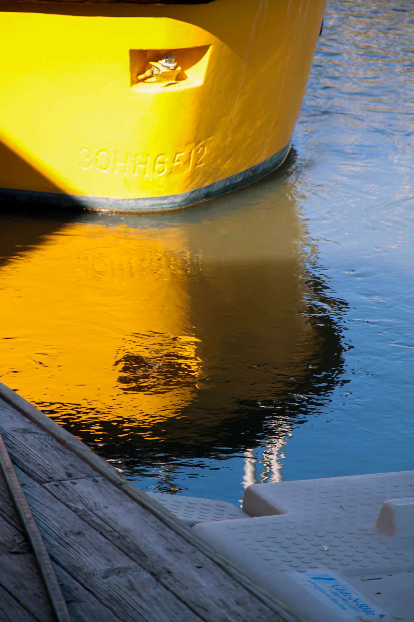 Yellow boat reflection