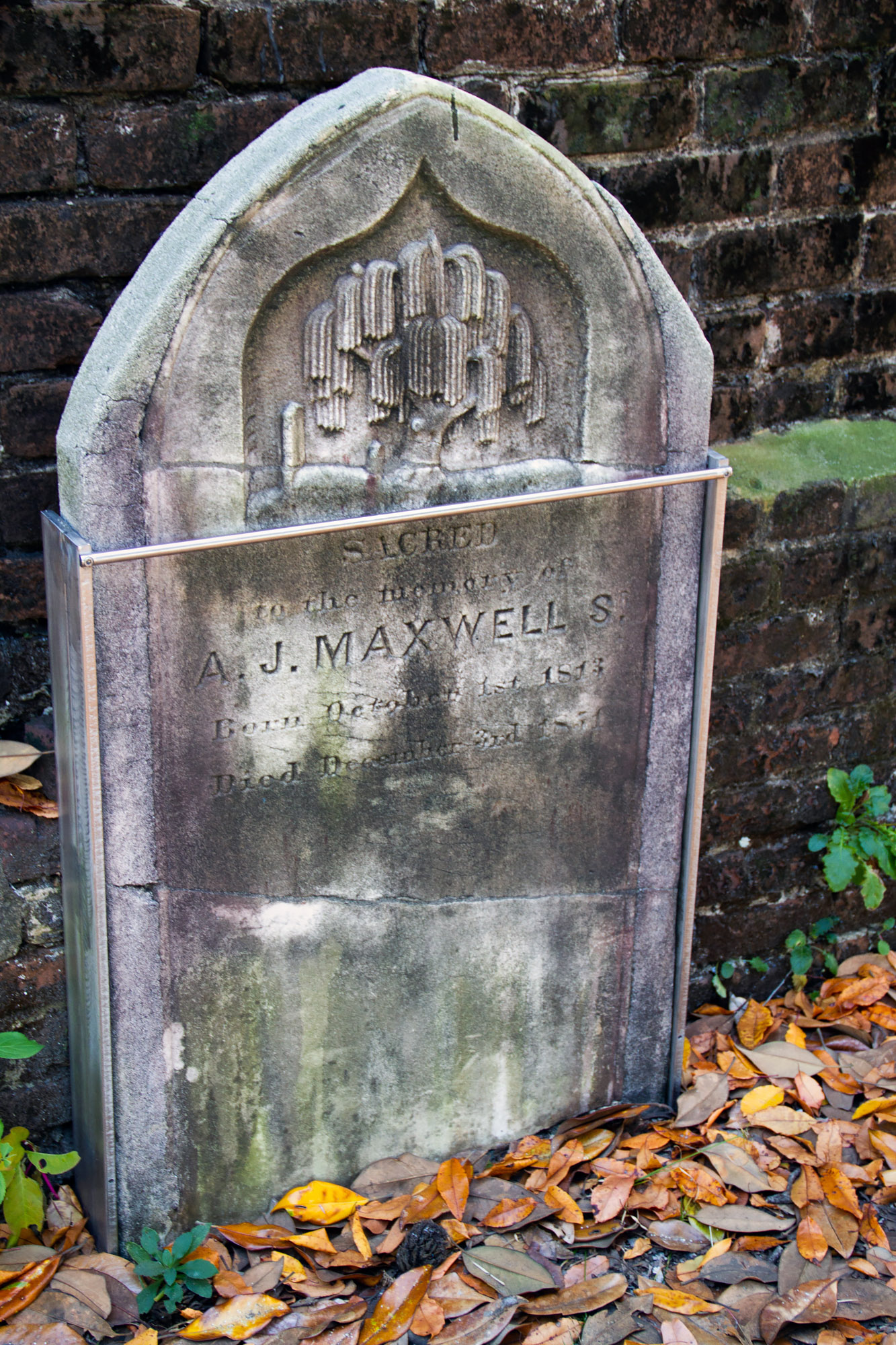 Grave Stone against a wall