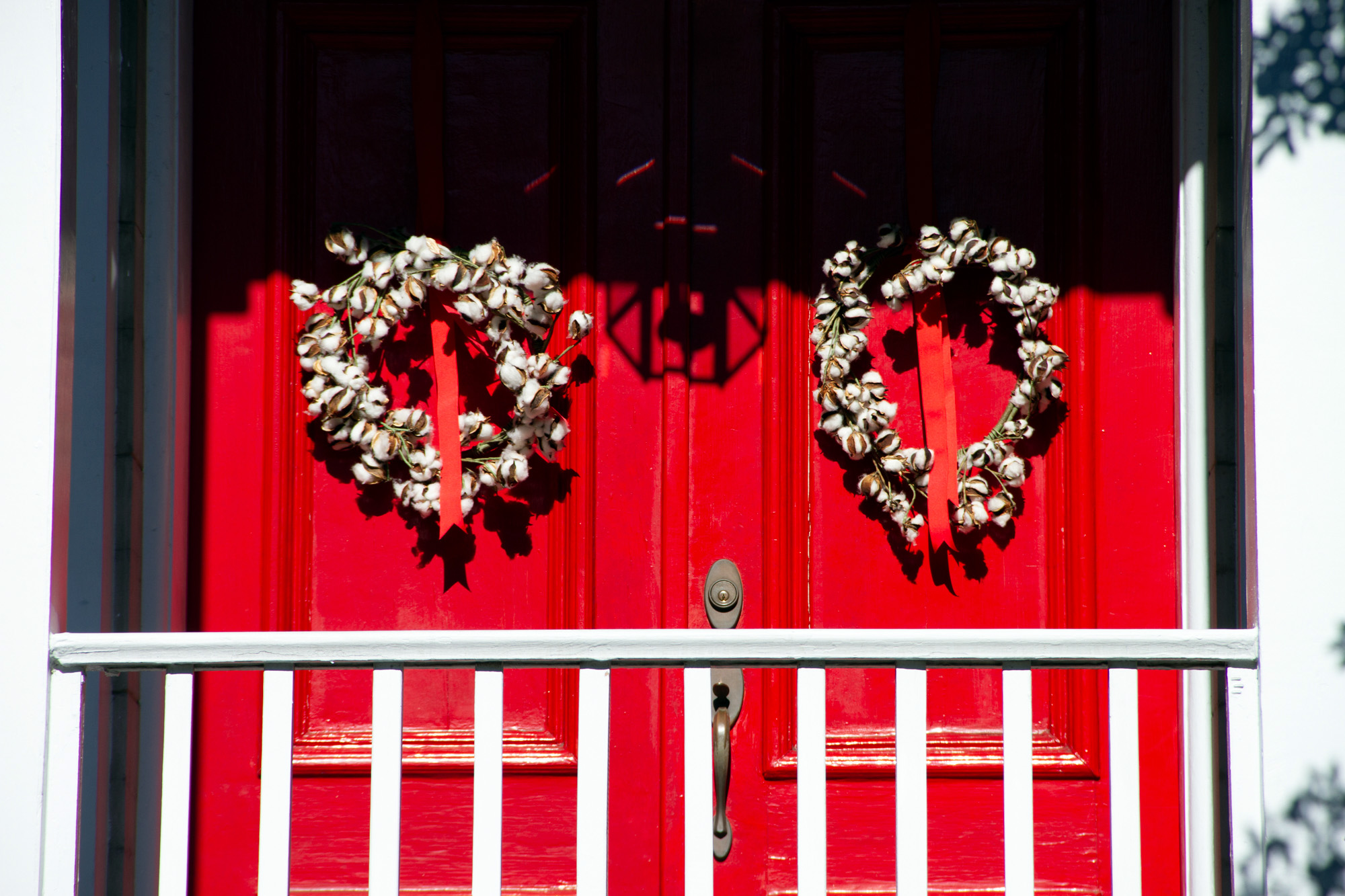 Cotton wreath on red door